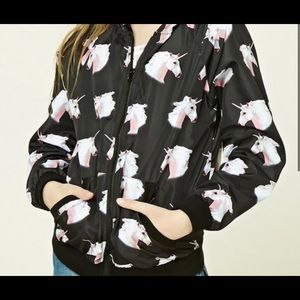 Black windbreaker with unicorns on it